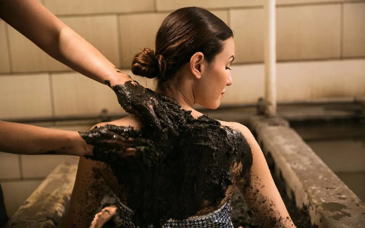 Guest in mud therapy at Indian Springs Calistoga